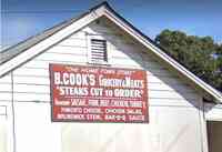 B . Cook's Grocery & Meats 'Steaks Cut to Order'