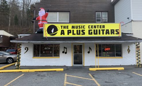 The Music Center Inc./ Dba A Plus Guitars