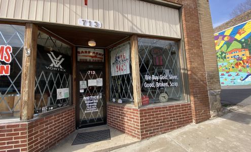 Bare Arms Gun & Pawn