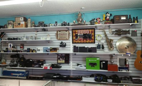 Ken's Buy Sell #1 Gold Buyer Pawn Shop!