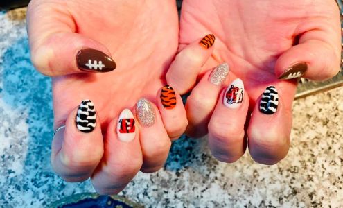 Tangles Hair Designers