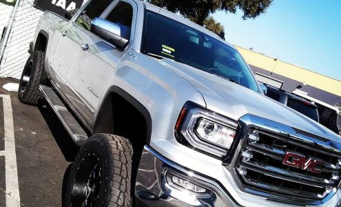 Above & Beyond Auto Body Paint and Towing