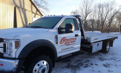 Creative auto body and sales and Towing