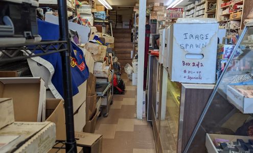 Tom's Coin, Stamp, & Gem