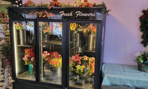 The Curious Rose Floral Designs