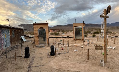 Glass Outhouse Art Gallery
