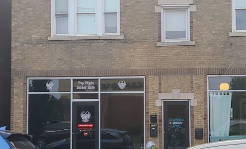 Top Flight Barber Shop LLC.