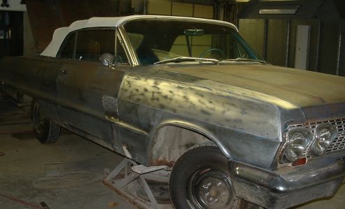 J M Auto Body Specialists Inc.