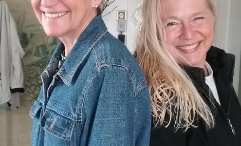 Atmosphere Hair Designs Inc