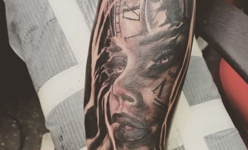 Tan the Man Tattoo & Body