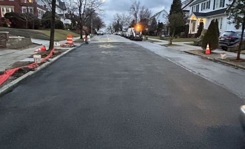 Prime asphalt paving and concrete