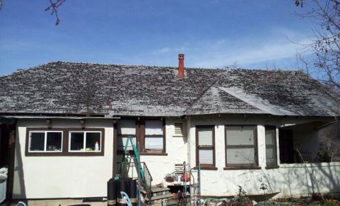 Custom Roofing & Gutters