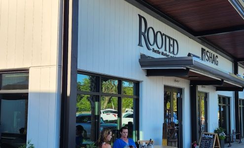 Rooted Bottle Market And Bar