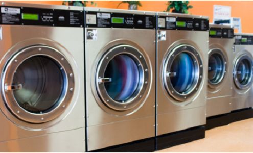 Log Cabin Laundry & Dry Cleaning 329 W Monroe St, Dundee Michigan 48131