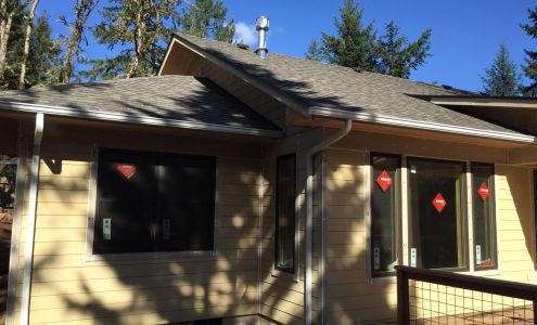 AMERICAN SEAMLESS GUTTERING INC