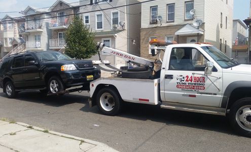 TUMI TOWING LLC