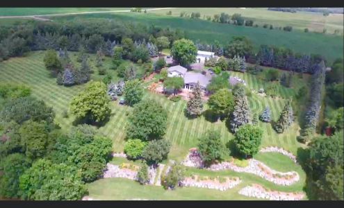 Hennen LawnCare & Log Carving Wendell