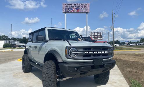 Courtesy Value Pre-Owned Highway 90