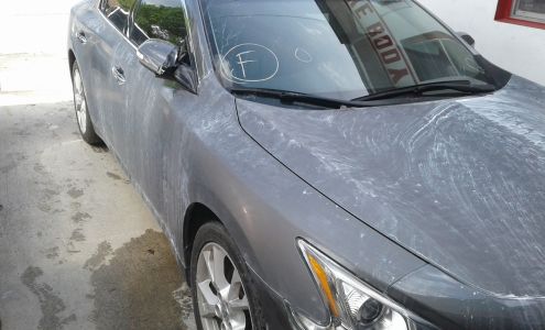 Deluxe Paint & Body Shop Inc