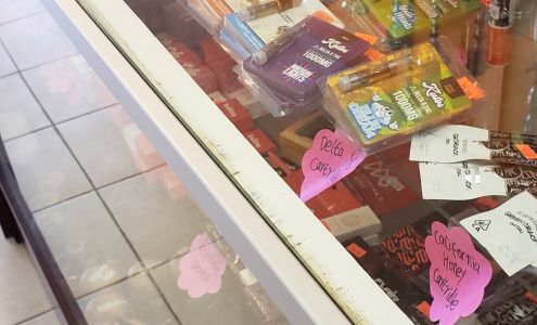 E C TOBACCO SMOKE SHOP