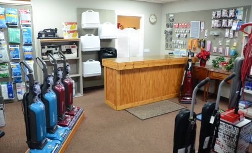 Mann's Sewing Machine and Sweeper