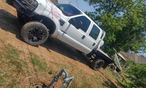 Stacy's auto and welding services In Ally behind house, 408 S Oklahoma Ave, Mangum Oklahoma 73554