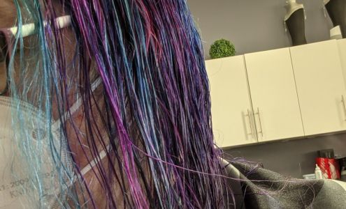 Through The Looking Glass Salon & Spa