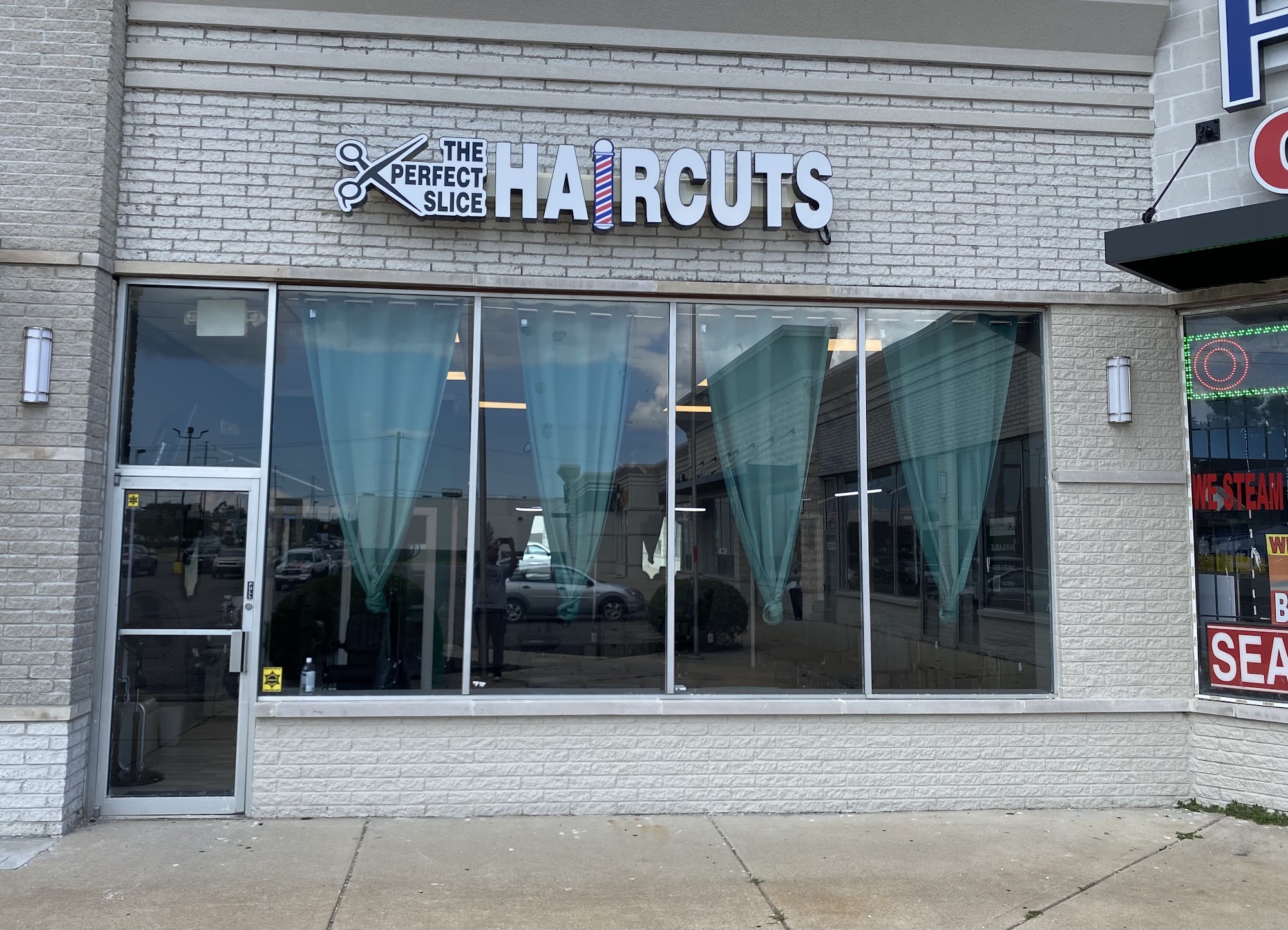 The perfect slice haircuts LLC