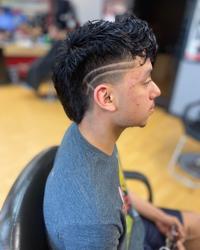 Sport Clips Haircuts of Westlake - West Bay Plaza